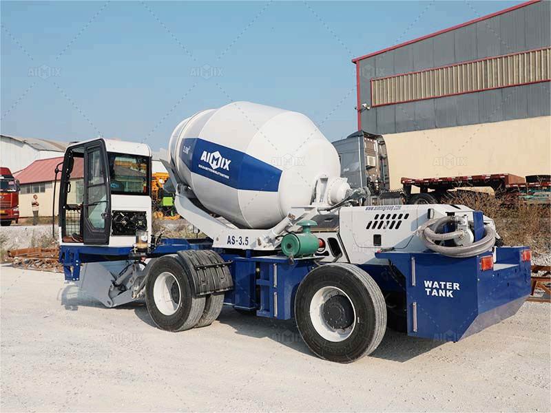 Self-loading concrete mixer on wheels